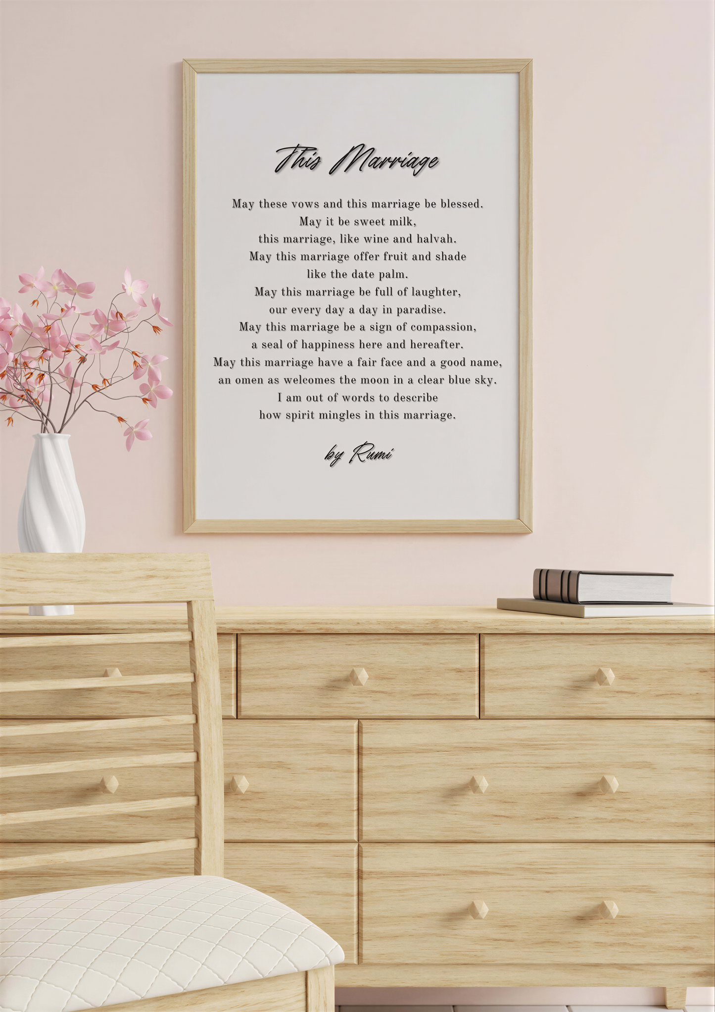 Rumi Wedding Poem Art displayed in an elegant frame, showcasing the poem 'This Marriage' on a soft pink wall.