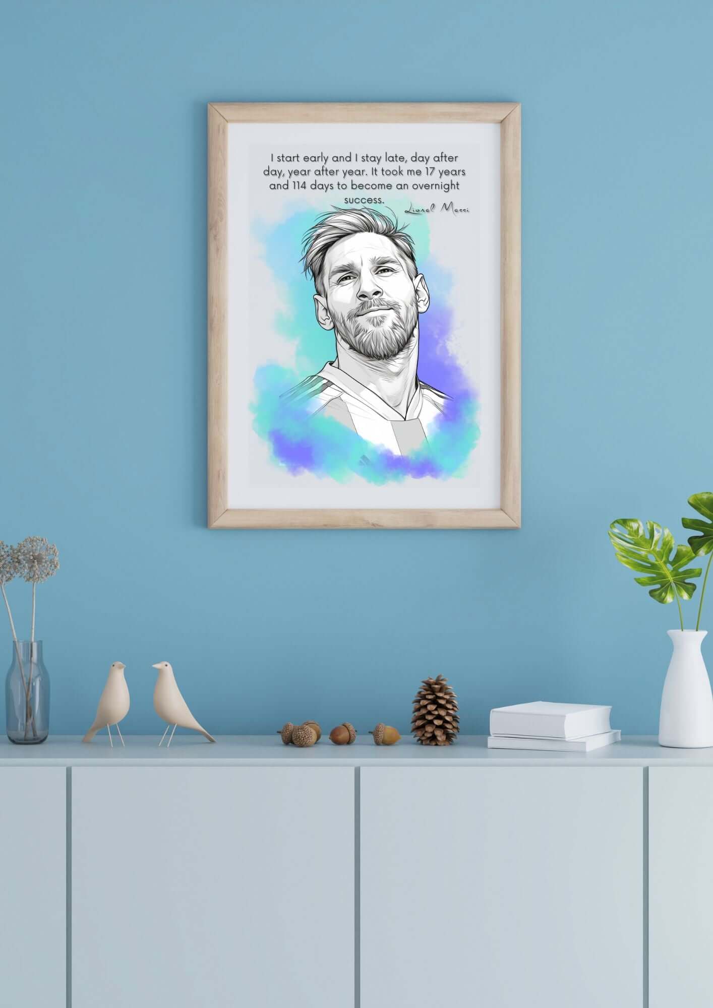Lionel Messi Motivational Quote Poster with inspirational message on a blue background, displayed on a modern wall.