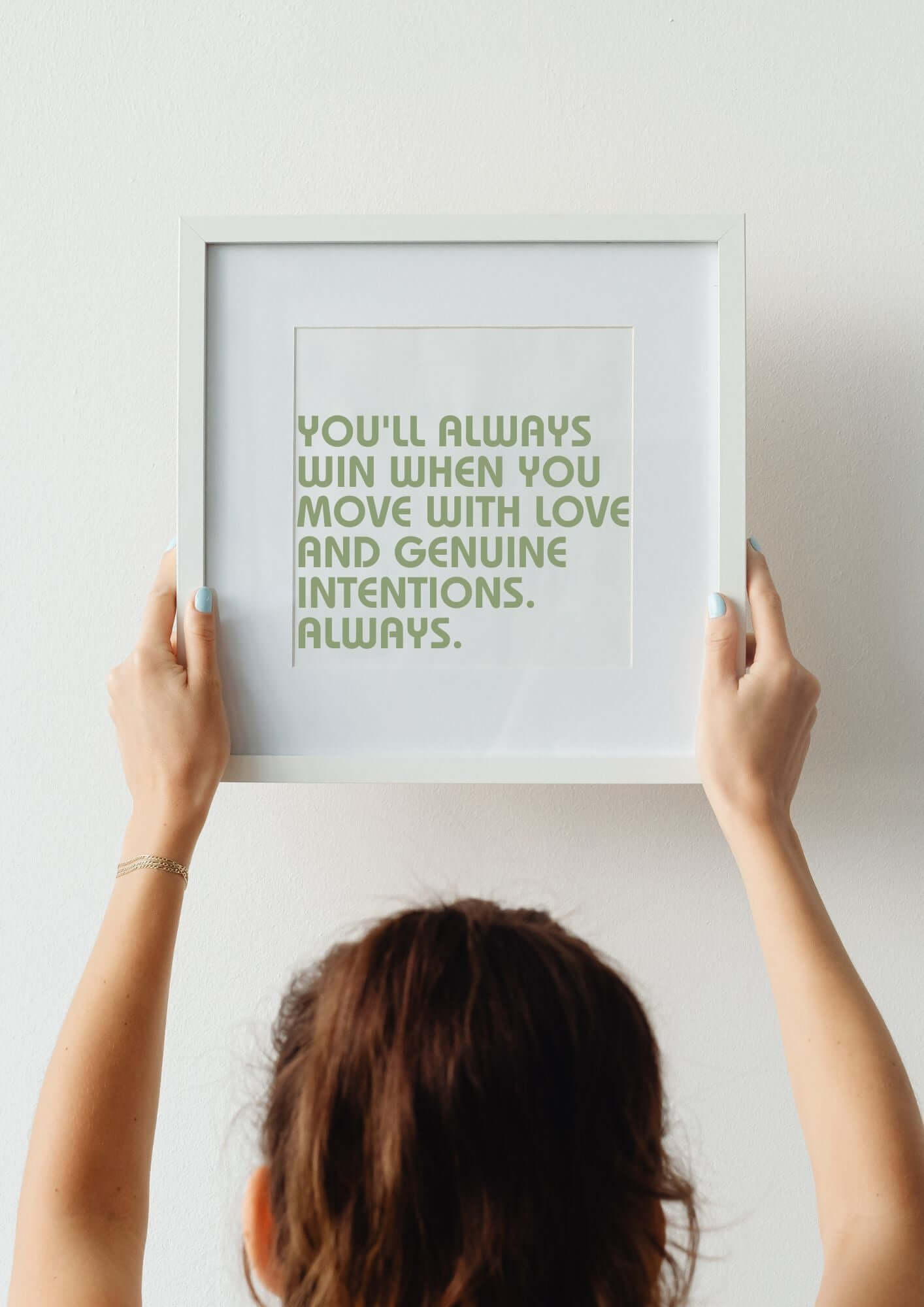 Hands holding framed "You'll Always Win" quote wall art – Move with Love Printable.