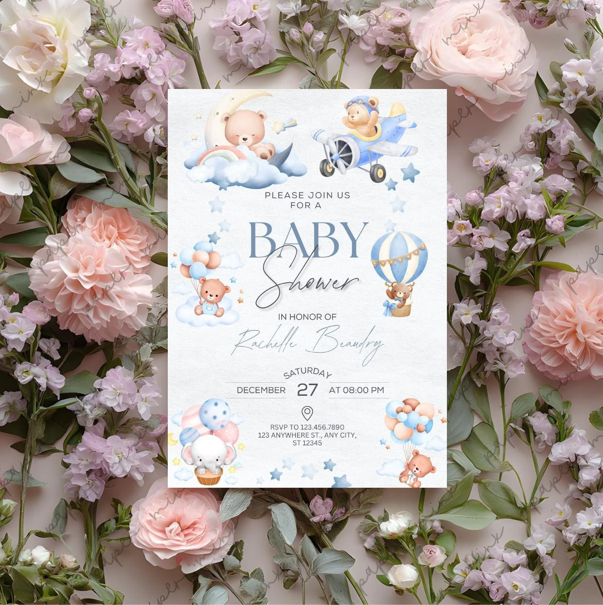 Baby shower invitation with teddy bears, balloons, and clouds surrounded by pink and purple flowers.