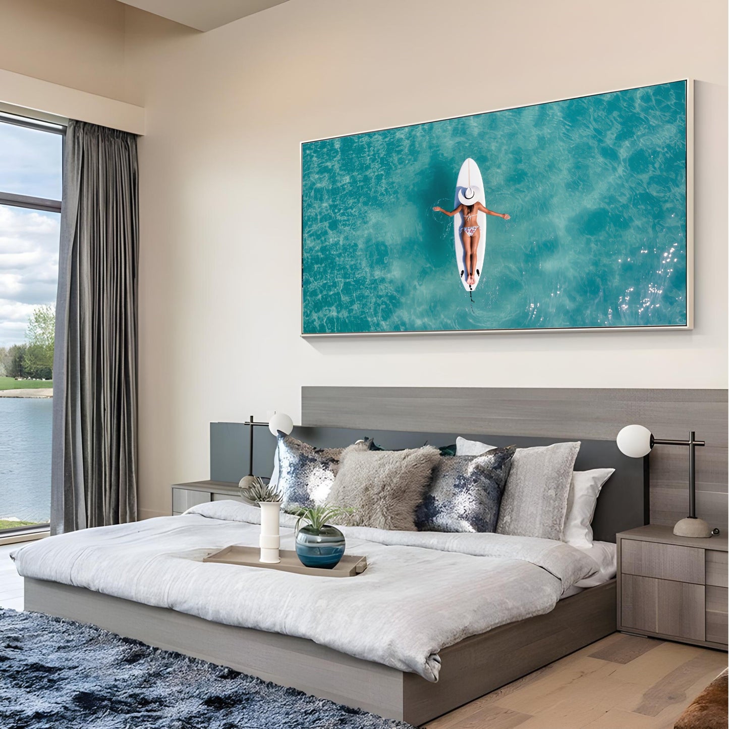 Alt Tag: Surfboard Woman Aerial Ocean Print – Minimalist Beach Wall Art, serene bedroom decor with turquoise ocean view from above.