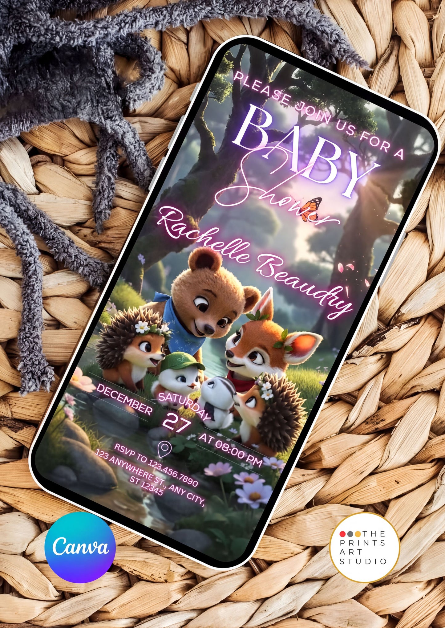 Editable Baby Shower Invitation on a phone with woodland animal theme and event details.