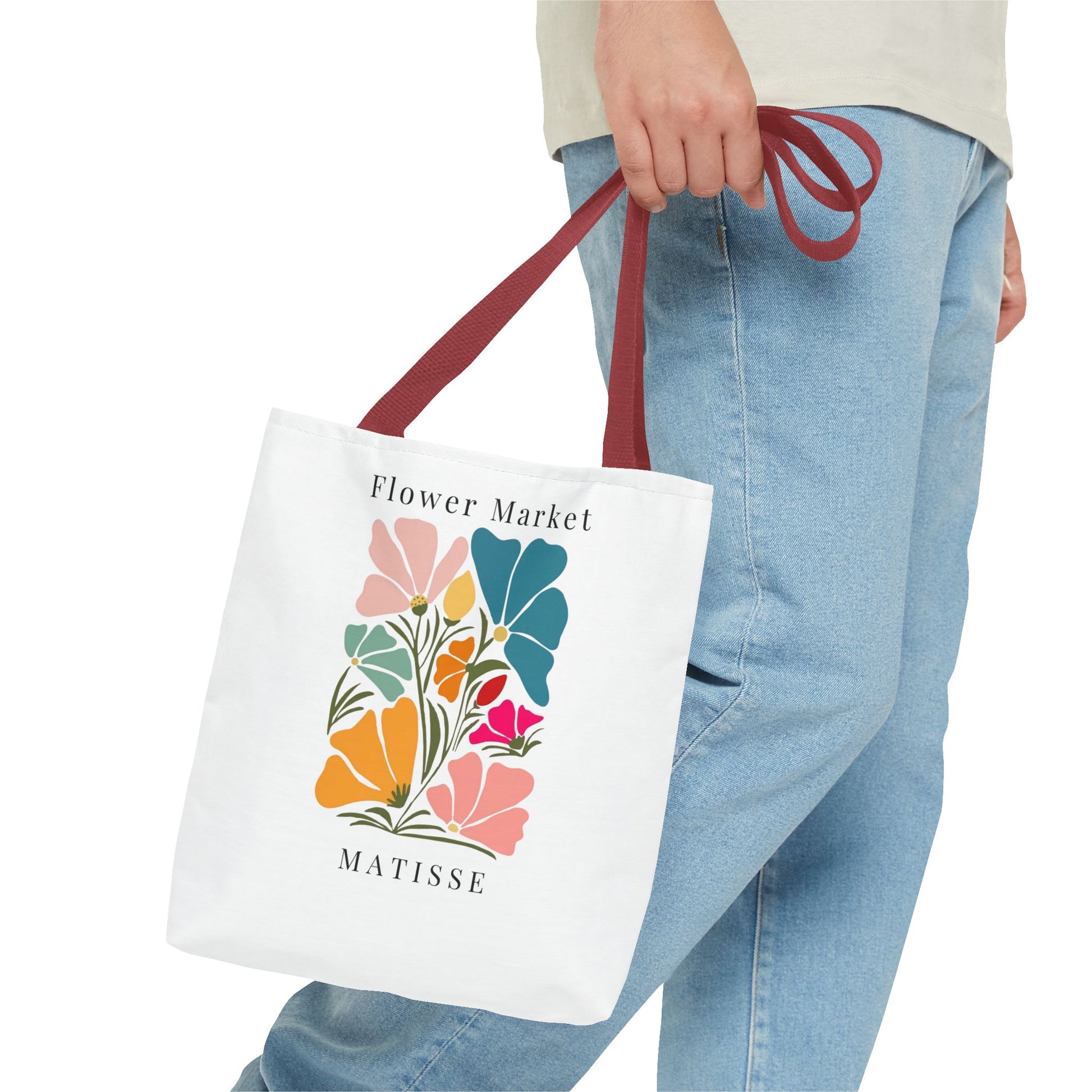 Henri Matisse tote bag with colorful floral design, vibrant art-inspired accessory held by person in casual jeans, perfect for art lovers.