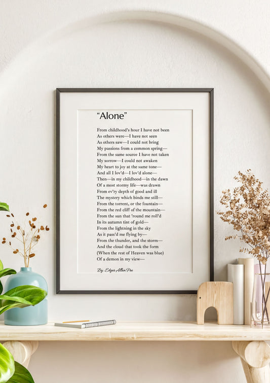 Alone Edgar Allan Poe Print displayed in a minimalist frame, featuring the poem 'Alone' on a decorative wall.