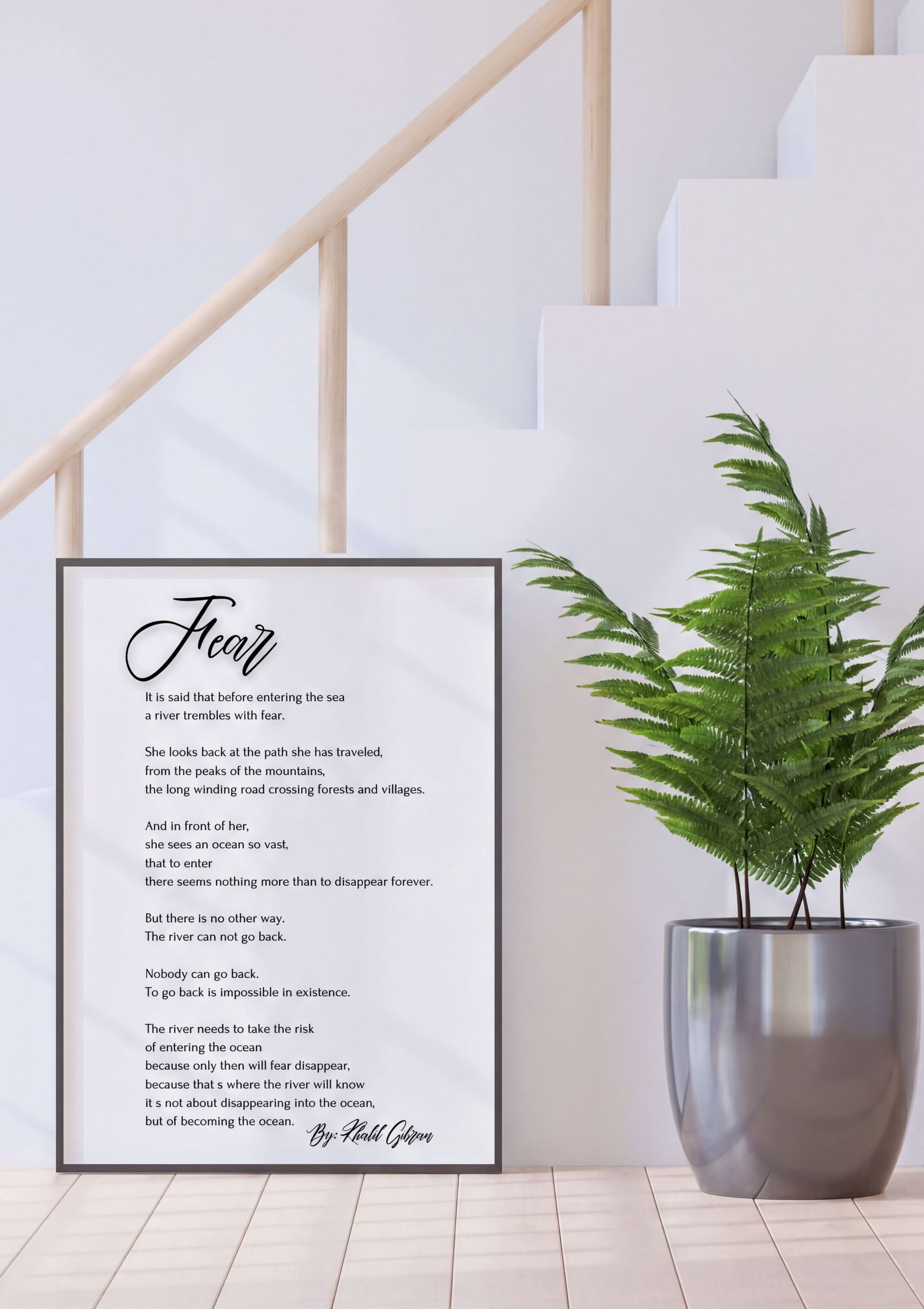 Fear - Khalil Gibran Poem Print displayed next to a potted plant in a modern home setting, minimalist black and white decor.