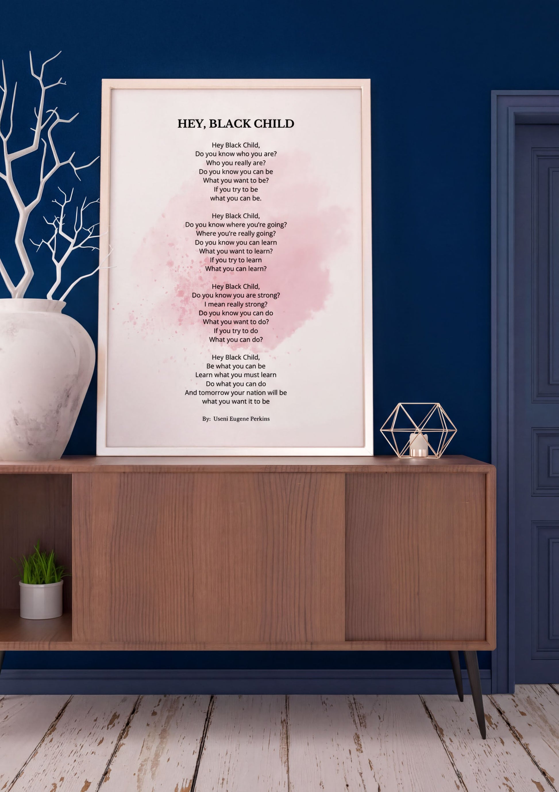 Hey Black Child Poem inspiring motivational poetry print framed on a wall above a wooden cabinet.