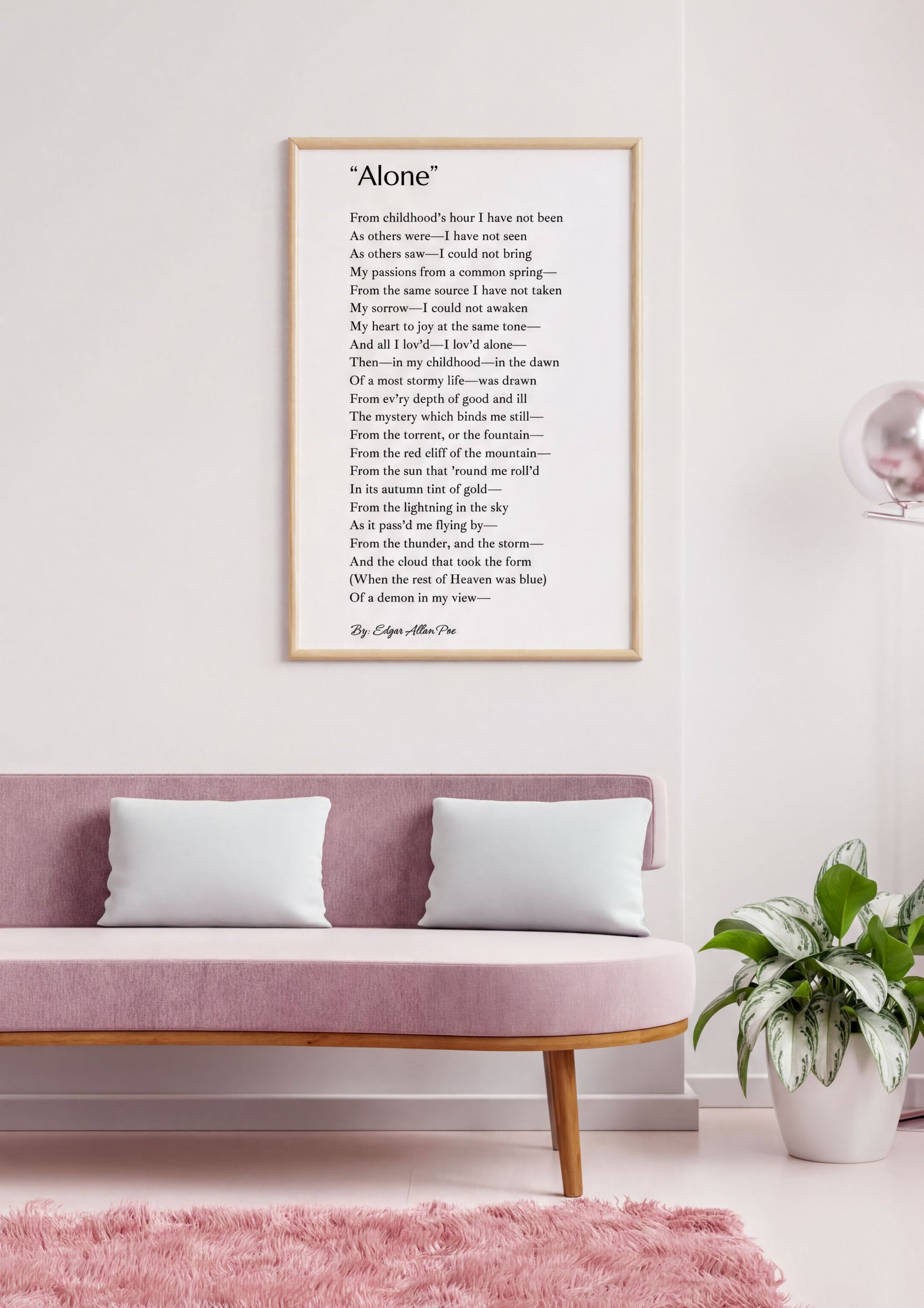 Alone Edgar Allan Poe Print displayed in a stylish living room with pink decor and minimalist design.