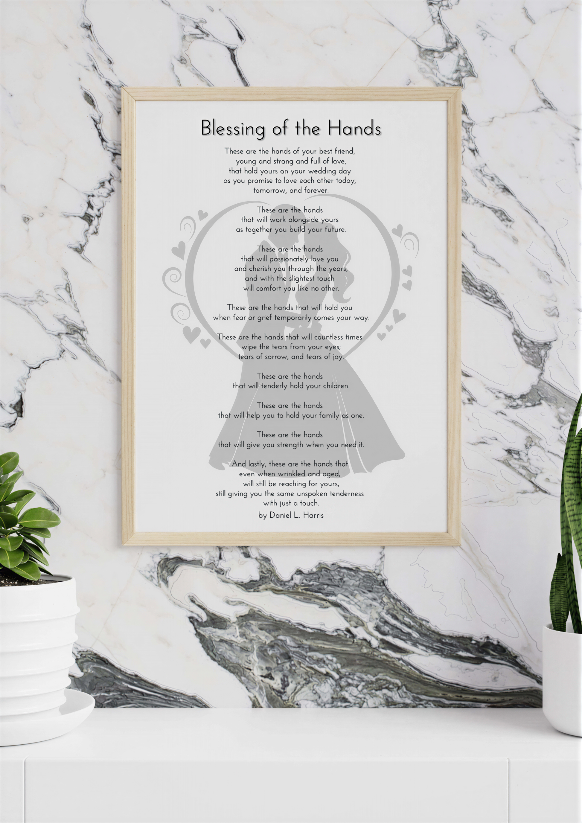 Wedding Blessing Poem displayed in elegant frame on marble wall background with plants.