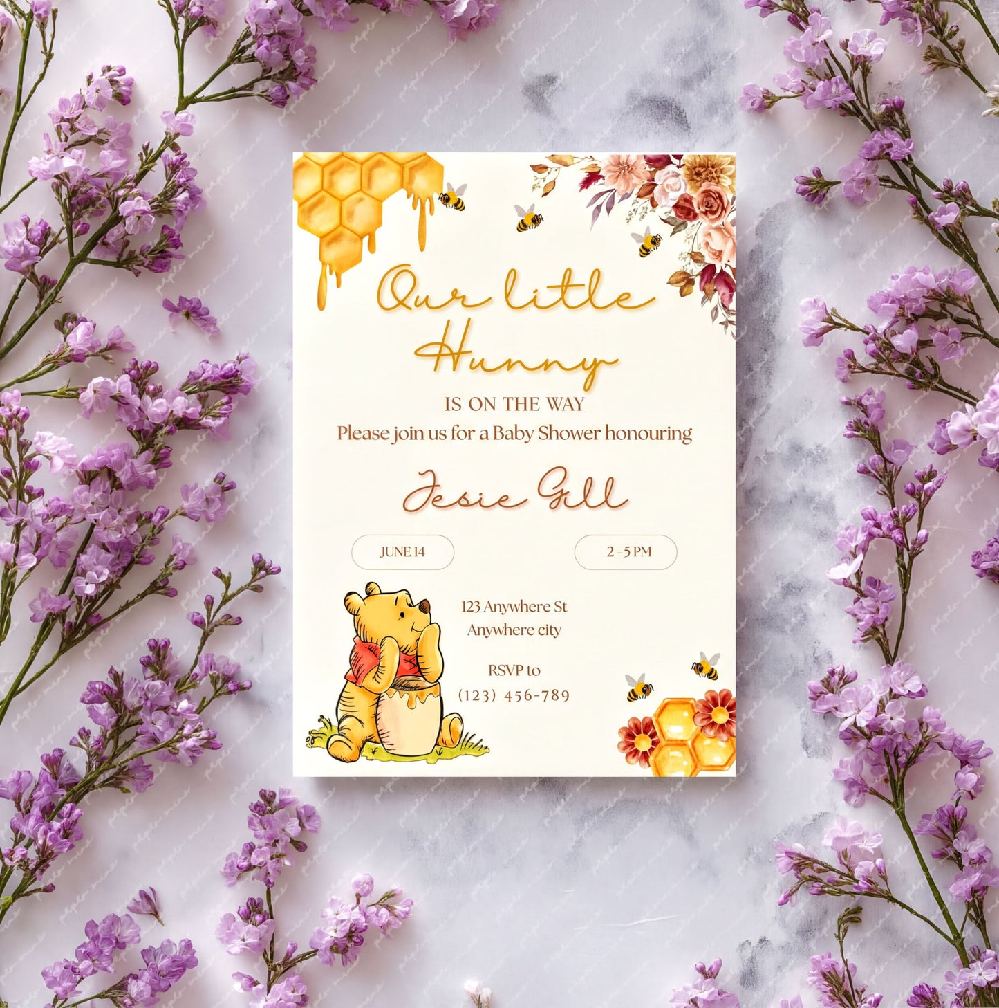 Winnie the Pooh Invitation for a baby shower featuring floral design and editable details.