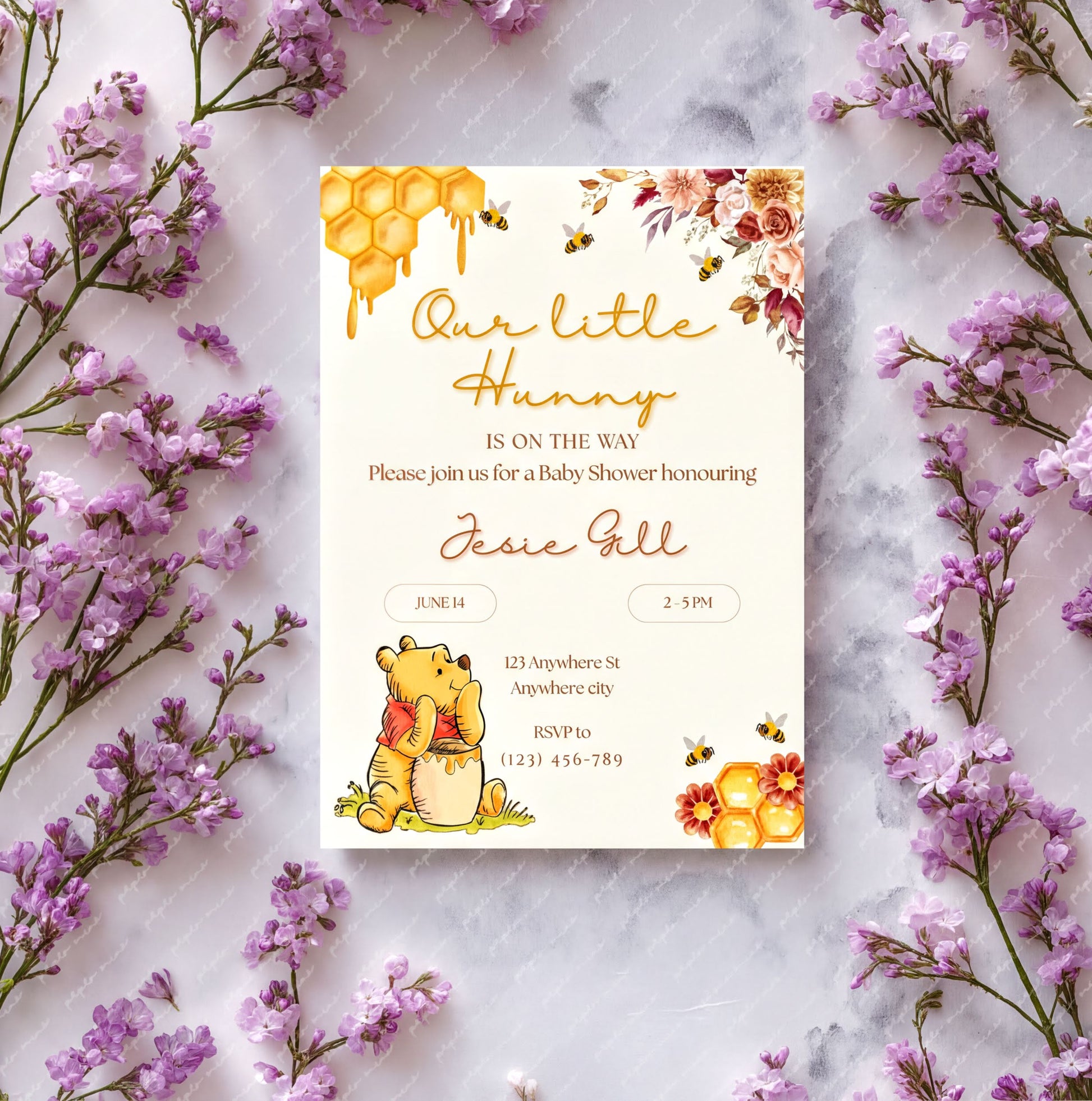 Winnie the Pooh Invitation for a baby shower featuring floral design and editable details.