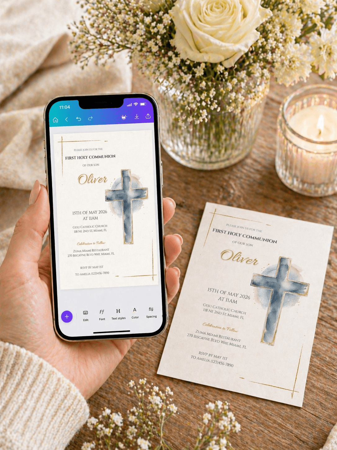 First Communion Invitation Printable displayed on a phone and card with floral decor and candle.