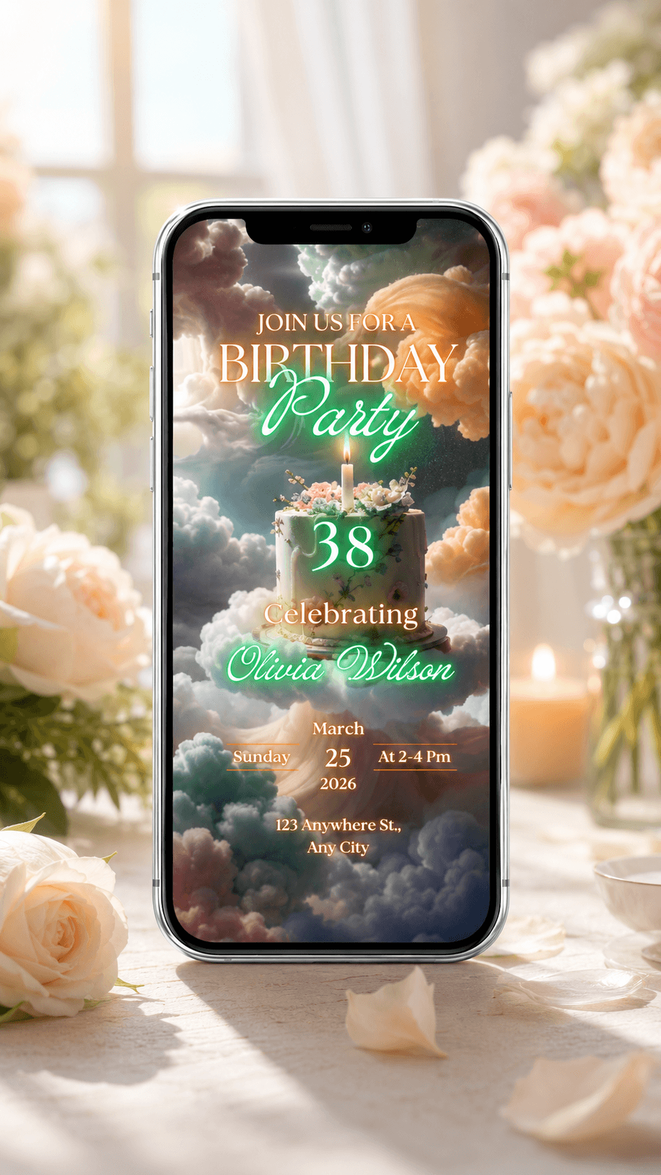 Cloud cake birthday video invitation displayed on a smartphone with floral decor.