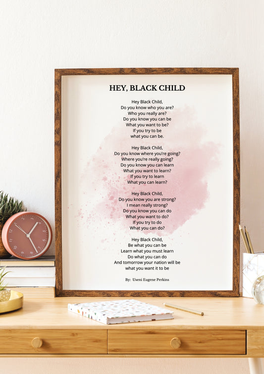 Hey Black Child - Useni Eugene Perkins Poem Print framed on a desk with motivational and empowering message for home or classroom decor.