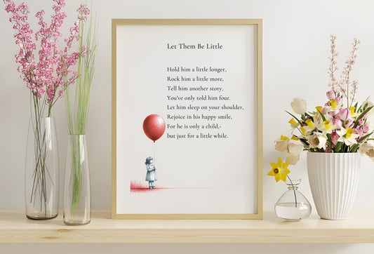"Let Them Be Little - Printable Poem" framed on a shelf with flowers, ideal for nurseries or baby shower gifts, celebrating childhood moments.