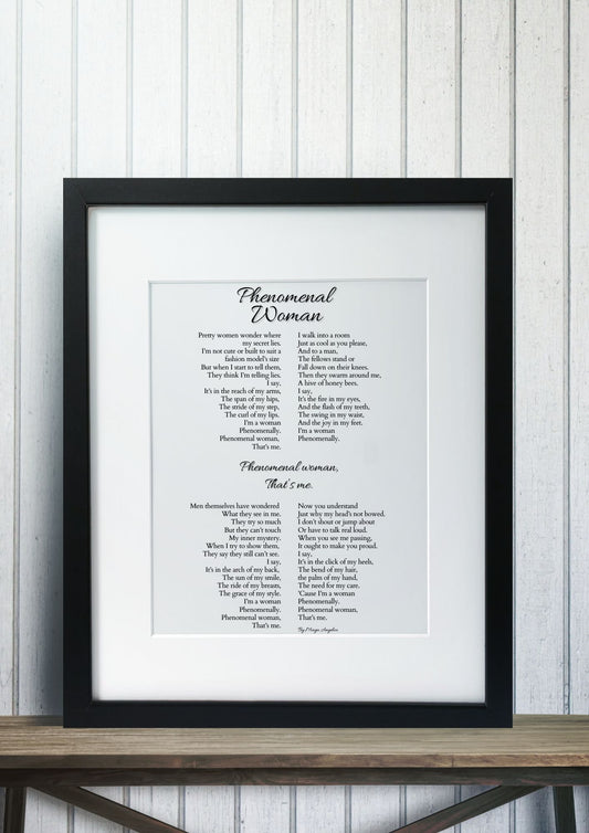 Phenomenal Woman – Maya Angelou Poem Print | Feminist Inspirational Wall Art in black frame on wooden table