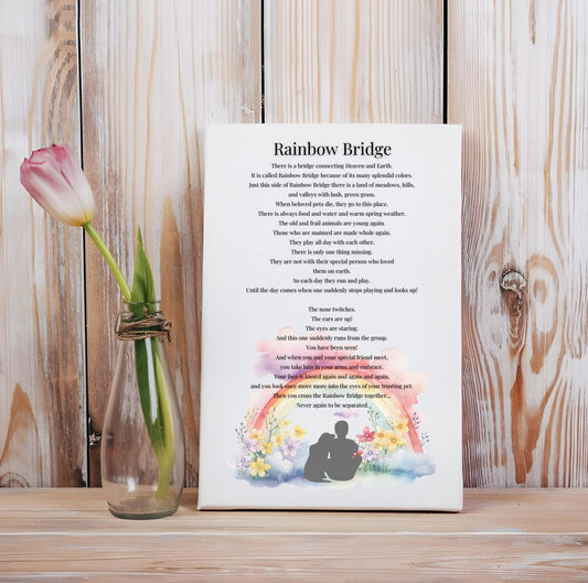 Rainbow Bridge – Heartfelt Pet Memorial Poem | Printable Wall Art displayed next to a tulip on a wooden surface.