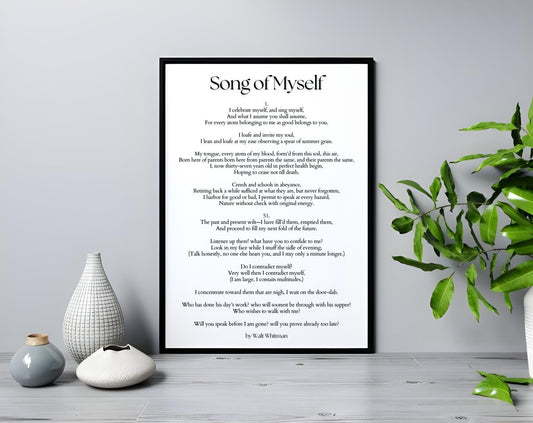 Song of Myself" by Walt Whitman – Inspirational Poetry Printable Wall Art framed on a wall with decorative vases and plants.