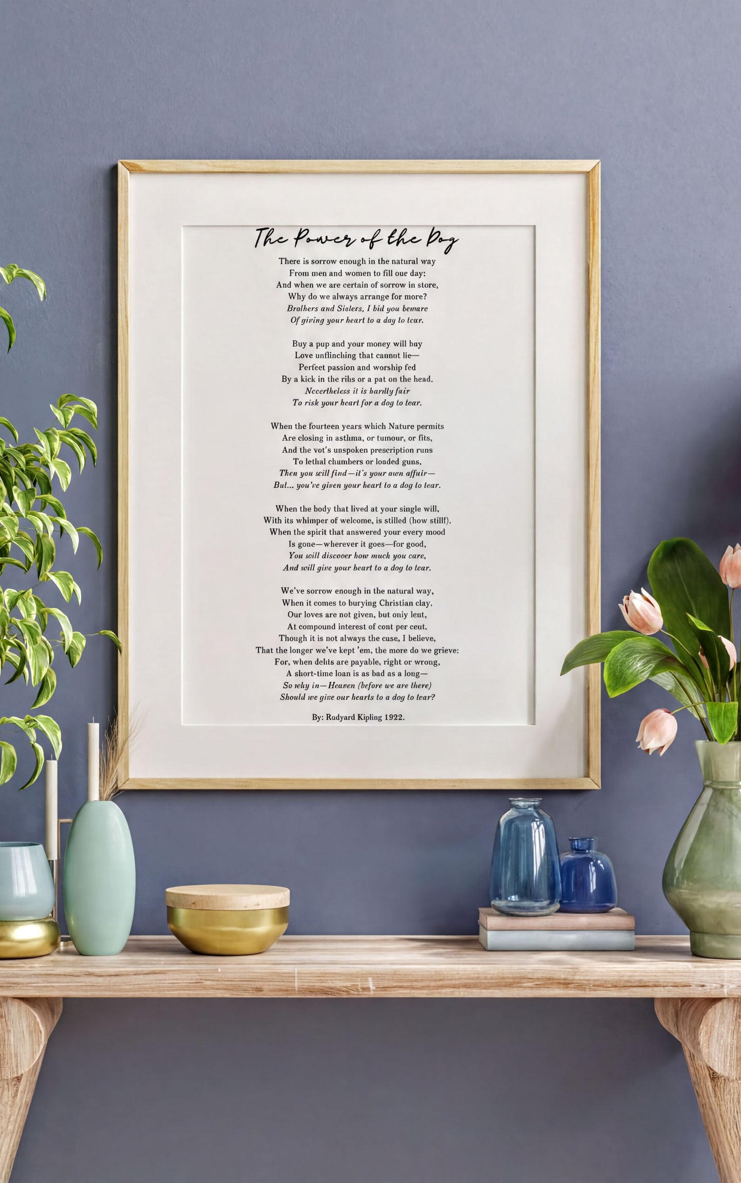 The Power of the Dog by Rudyard Kipling – Heartfelt Pet Loss Poem Print framed on a wall with plants and decor items nearby.
