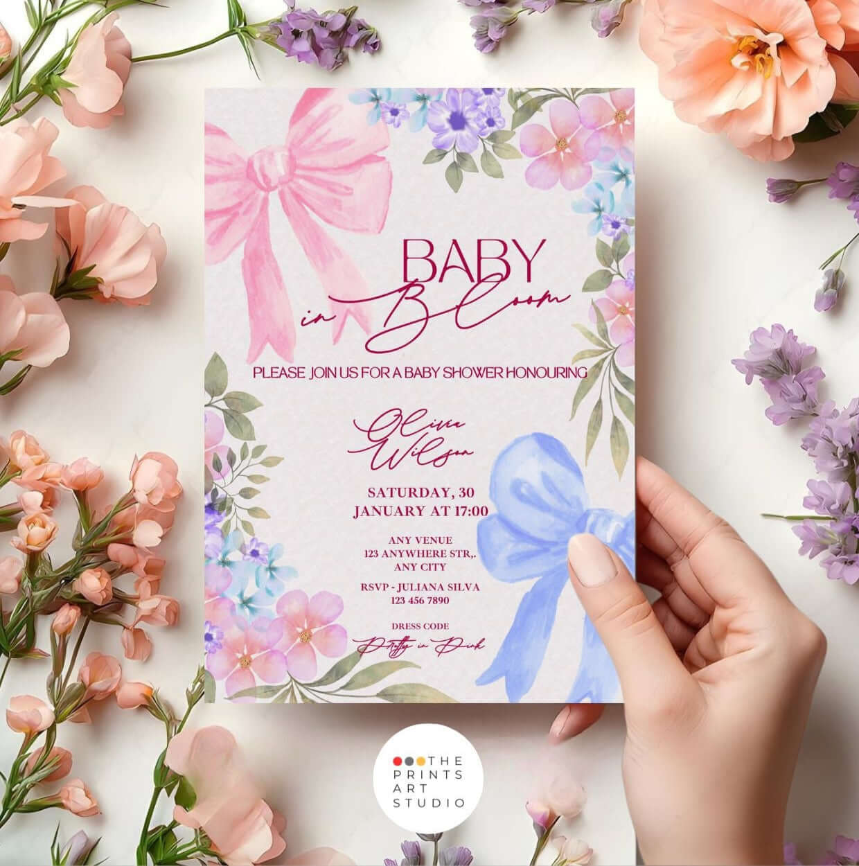 Baby in Bloom baby shower invitation with pink floral design and bow.