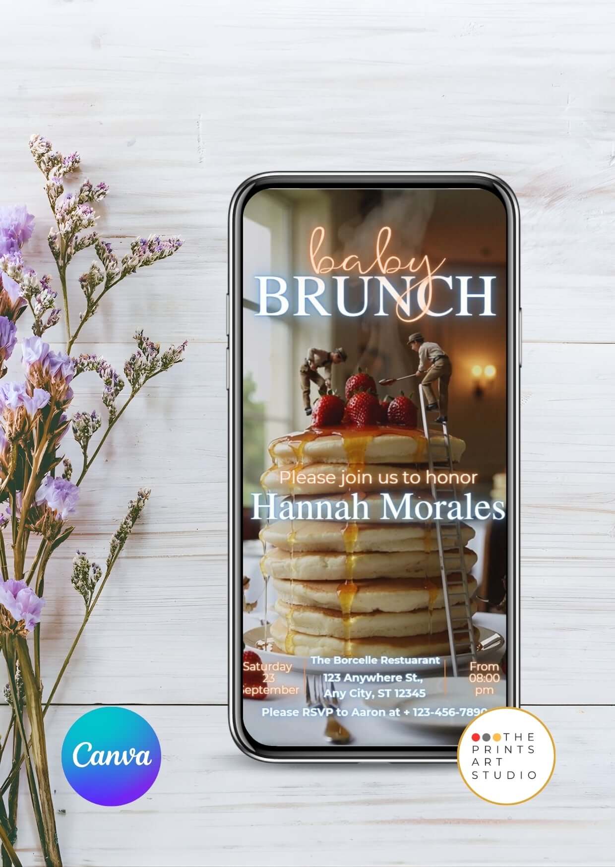 Baby Shower Video Invitation Dreamy Canva Editable template displayed on a phone with pancakes and flowers background.