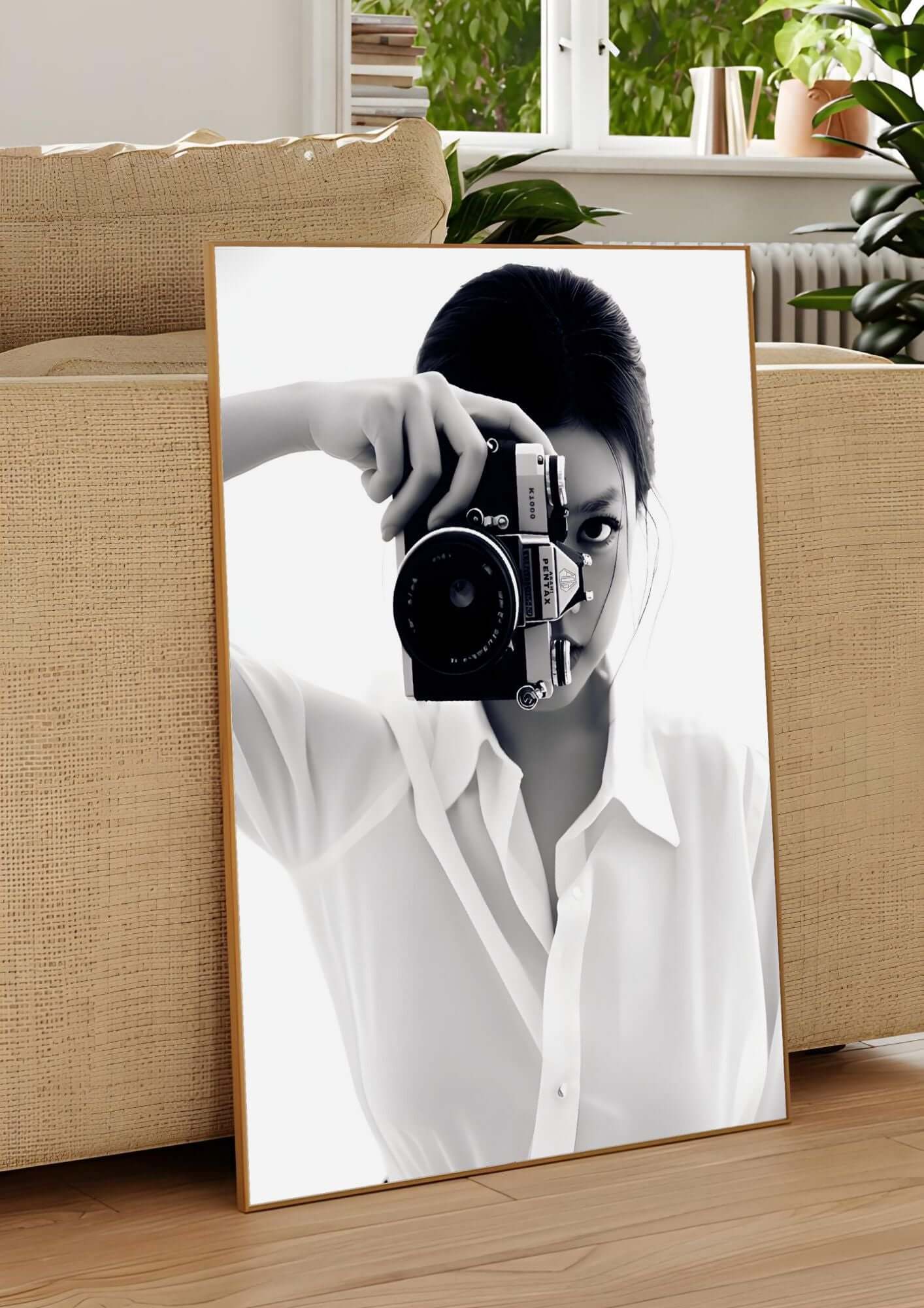 Black and White Photography Wall Art – Vintage Camera Minimalist Print displayed on a modern living room floor.