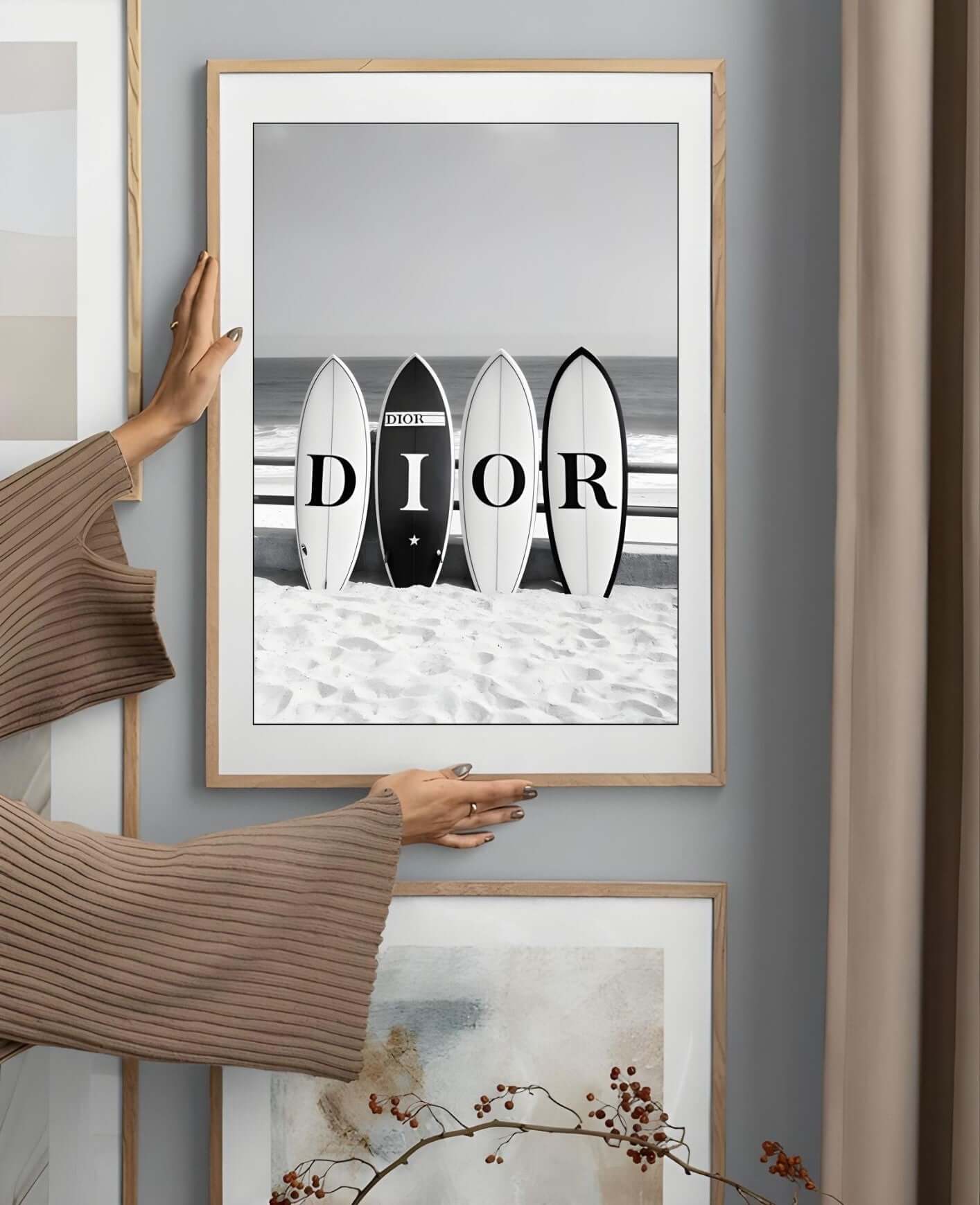 Black and white surfboards wall art, featuring four surfboards on a sandy beach, evoking coastal modern design and elegance.