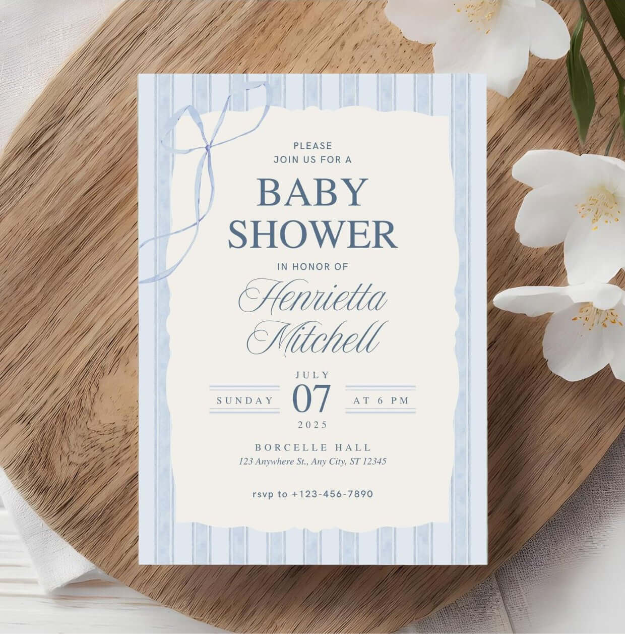 Blue Elegant Baby Shower Invitation | Classic Watercolor Boy Shower Template | Printable Digital Invite displayed on wooden board with white flowers