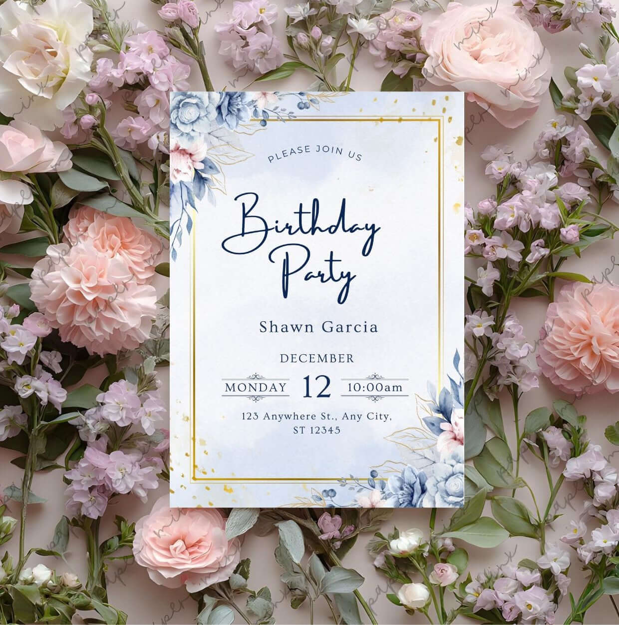 blue and gold birthday invitation with watercolor floral design and gold accents on a background of pink and white flowers