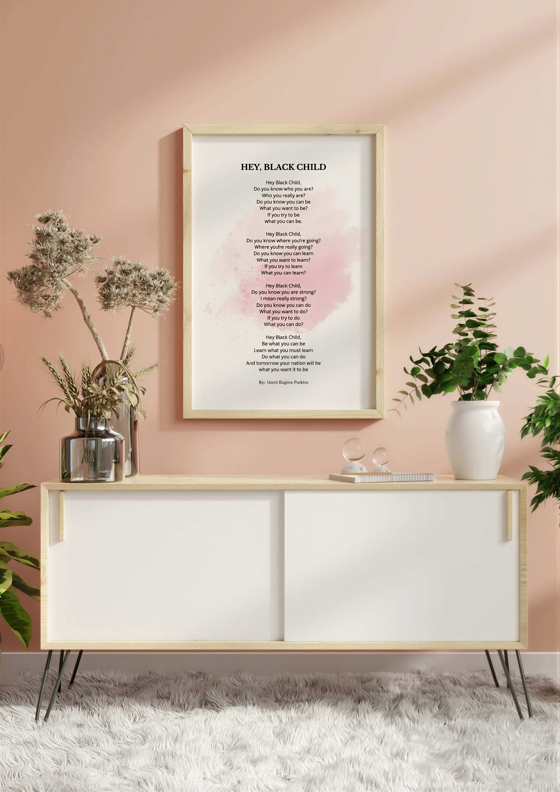 Hey Black Child Poem framed print displayed above a modern white cabinet in a stylish room setting.