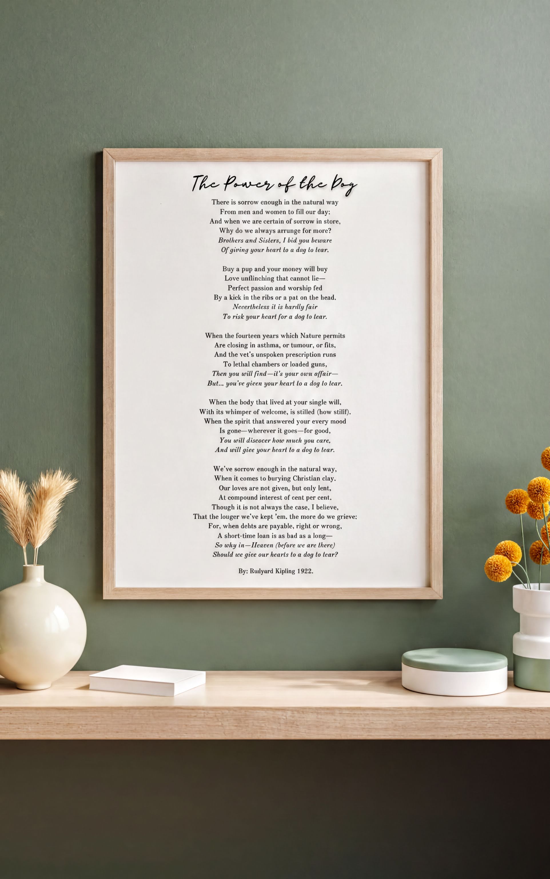 Framed print of 'The Power of the Dog by Rudyard Kipling – Heartfelt Pet Loss Poem Print' on a shelf with decor.