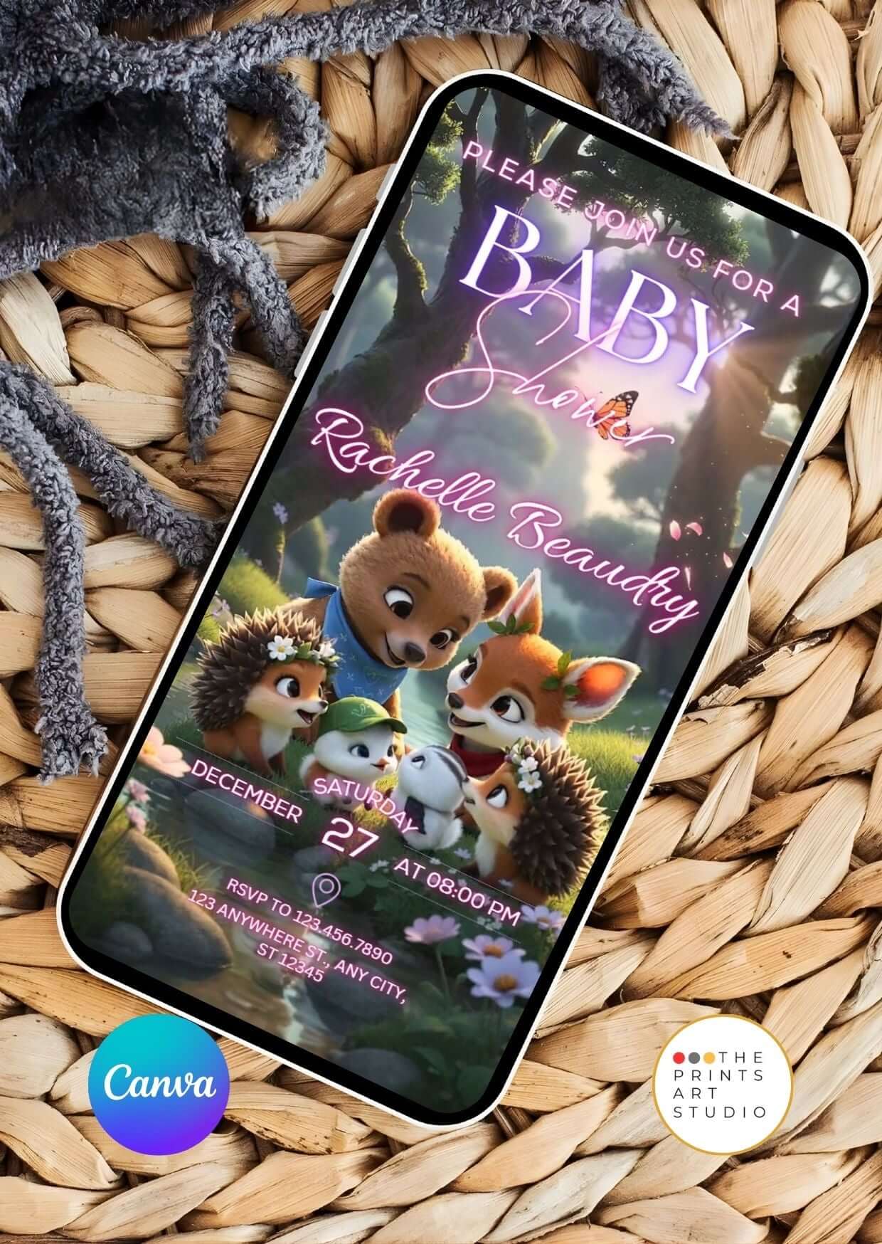 Editable Baby Shower Video Invitation with forest animals on a smartphone screen laying on a wooden surface with yarn decoration