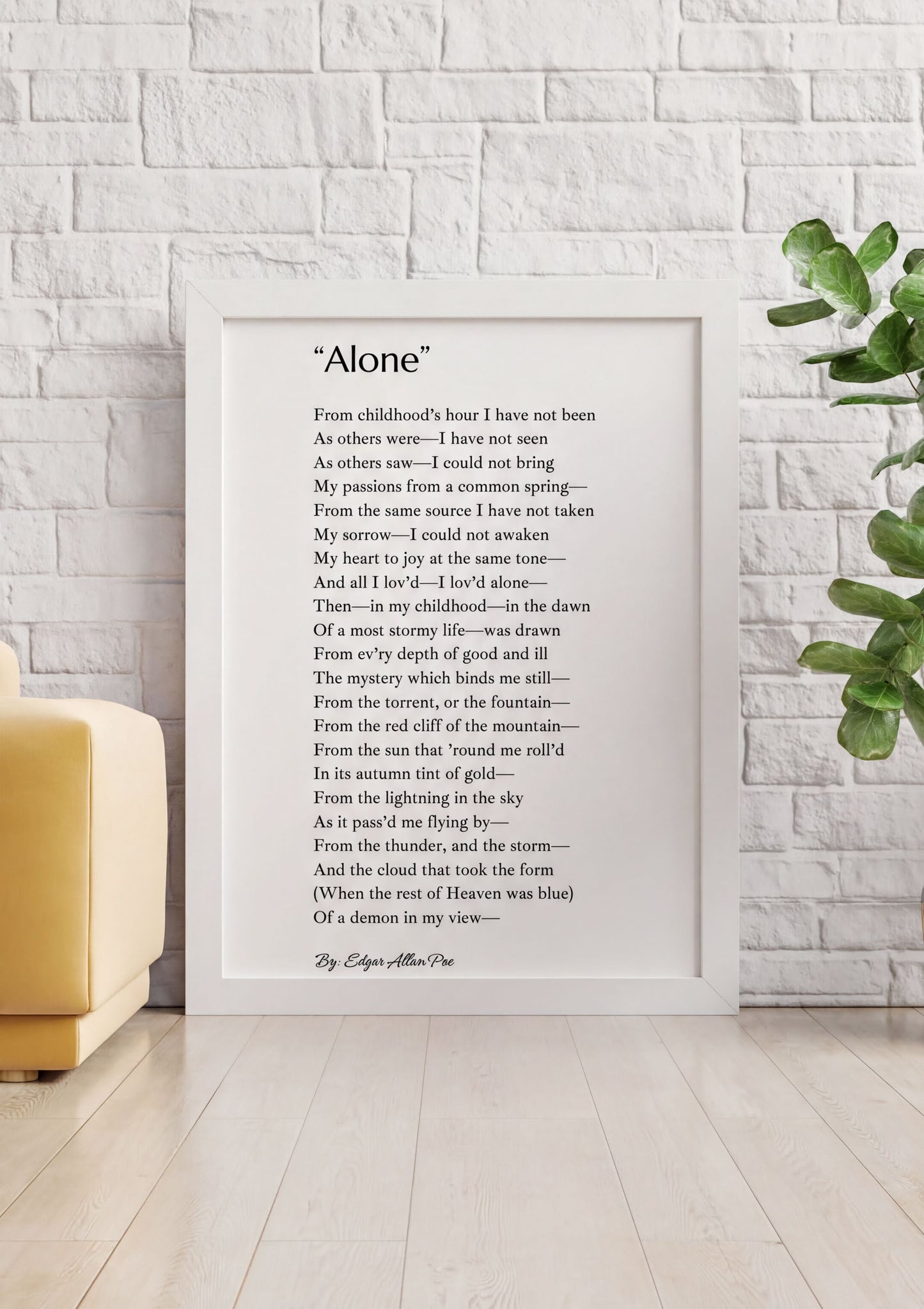 Alone Edgar Allan Poe Print displayed in a minimalist decor setting with a potted plant.