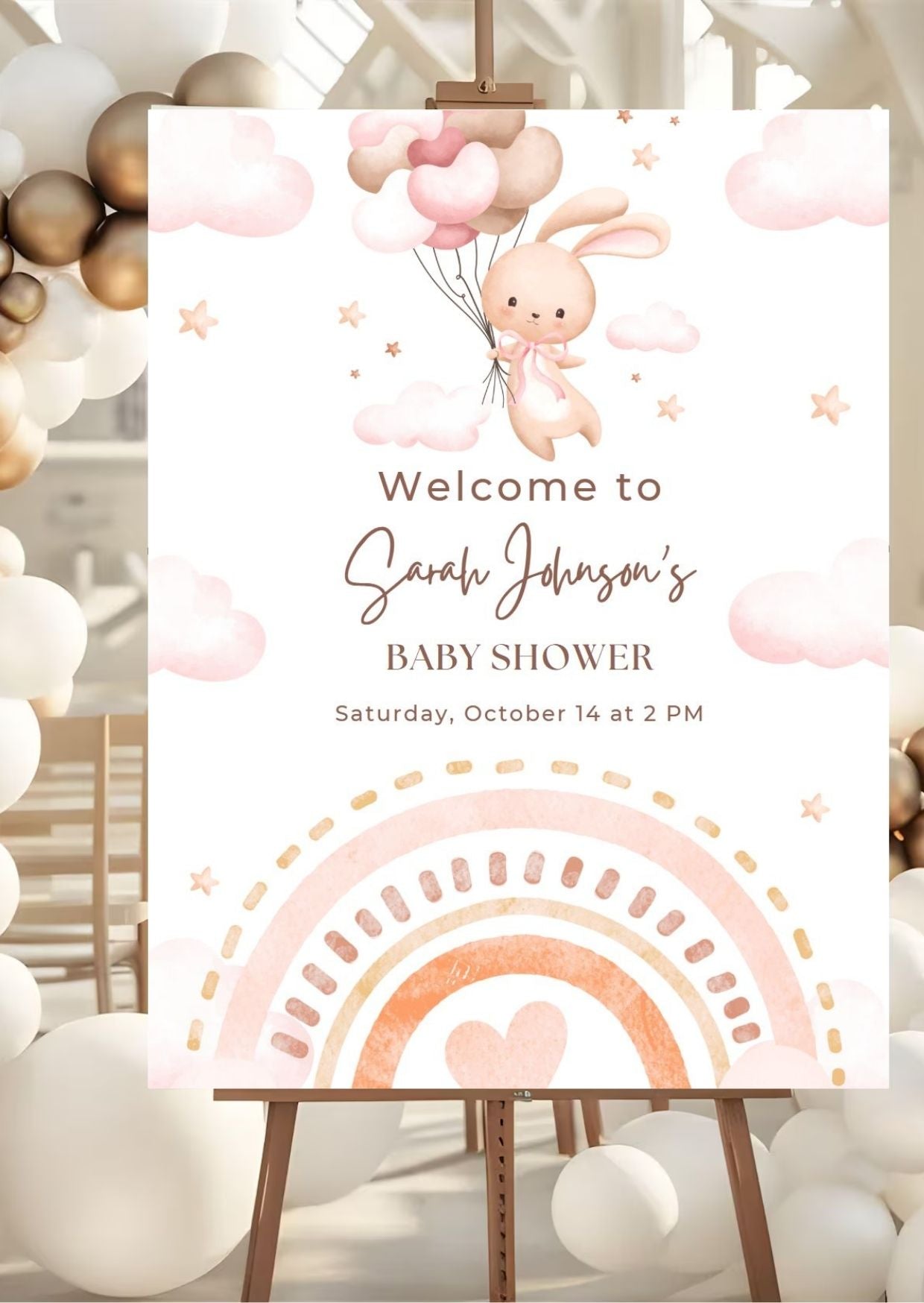 Baby shower welcome sign featuring an adorable bunny with balloons in a pastel theme, perfect for celebrations.