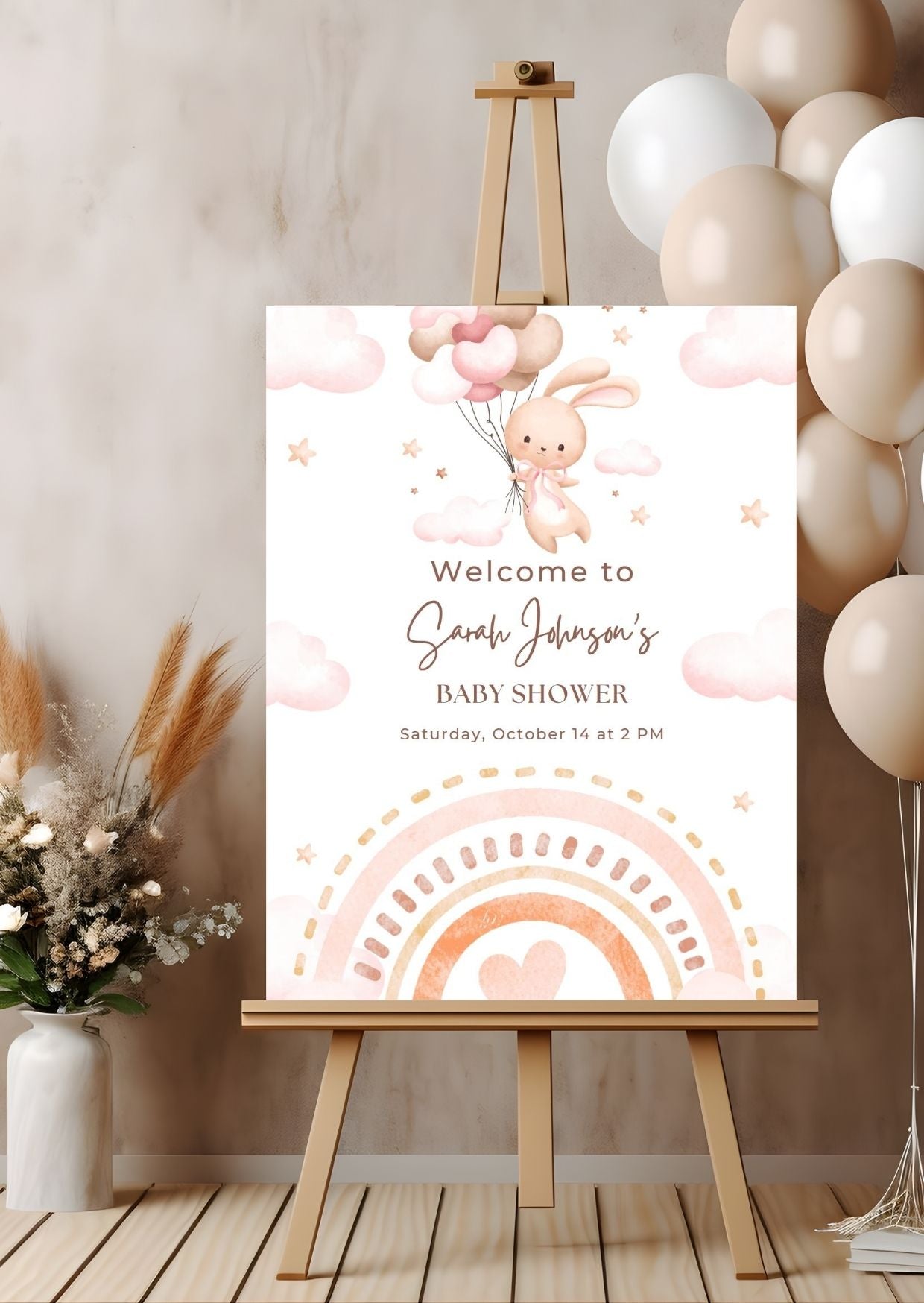 Baby shower welcome sign featuring a bunny with balloons in pastel colors, perfect for a baby shower celebration.