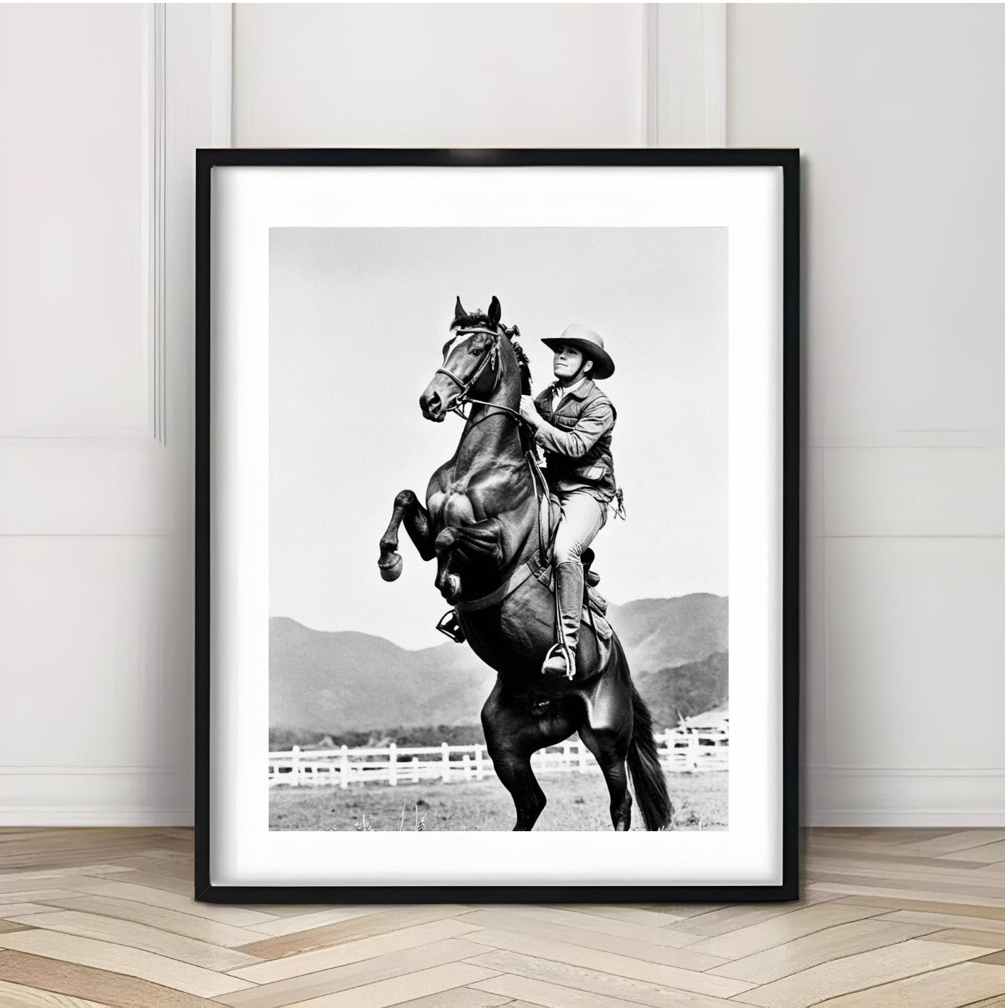 Western Wall Art featuring a cowboy on a rearing horse in black and white, capturing frontier spirit and vintage ranch life aesthetics.
