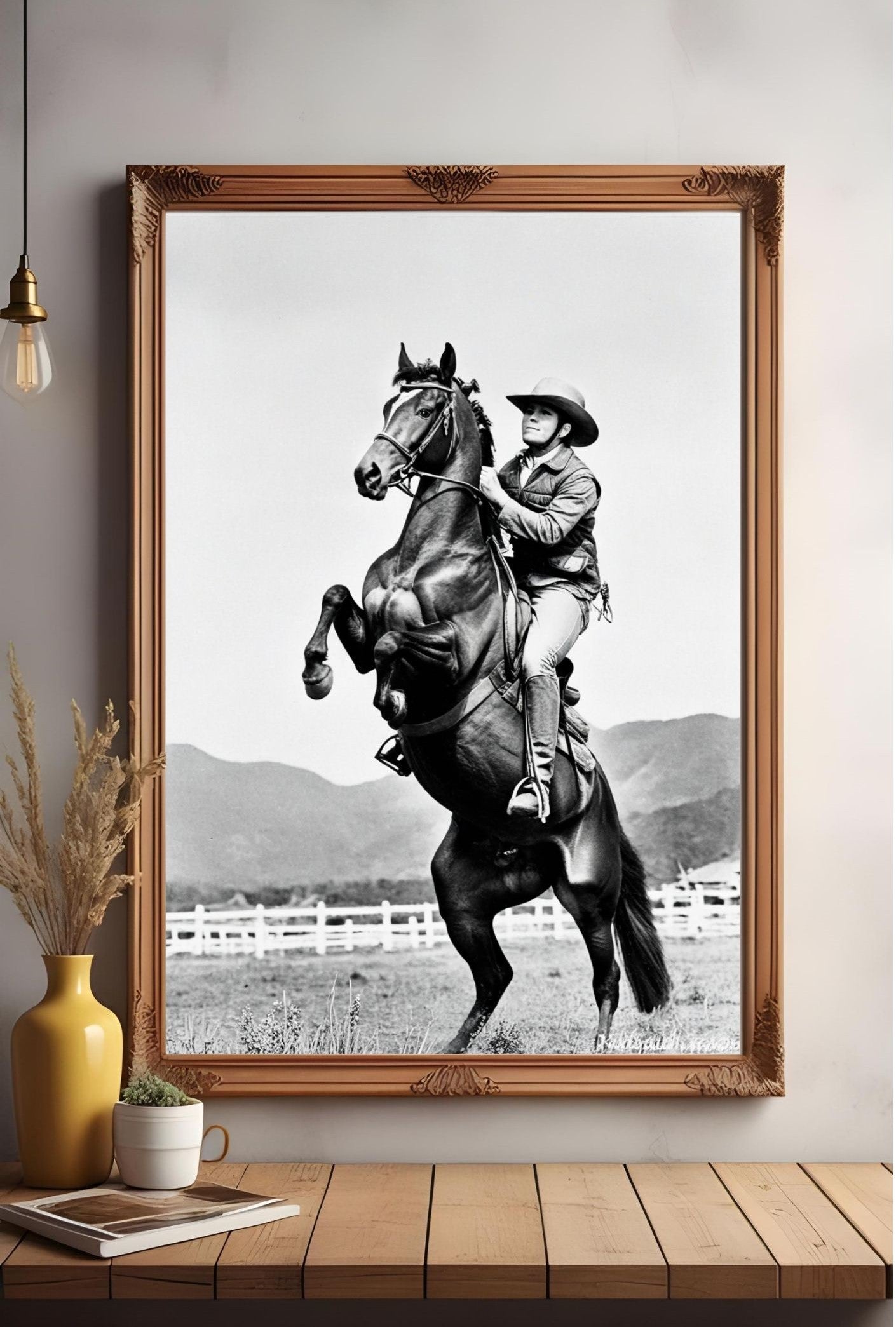 Western Wall Art black and white cowboy print with rearing horse, evoking American frontier spirit and vintage aesthetics.