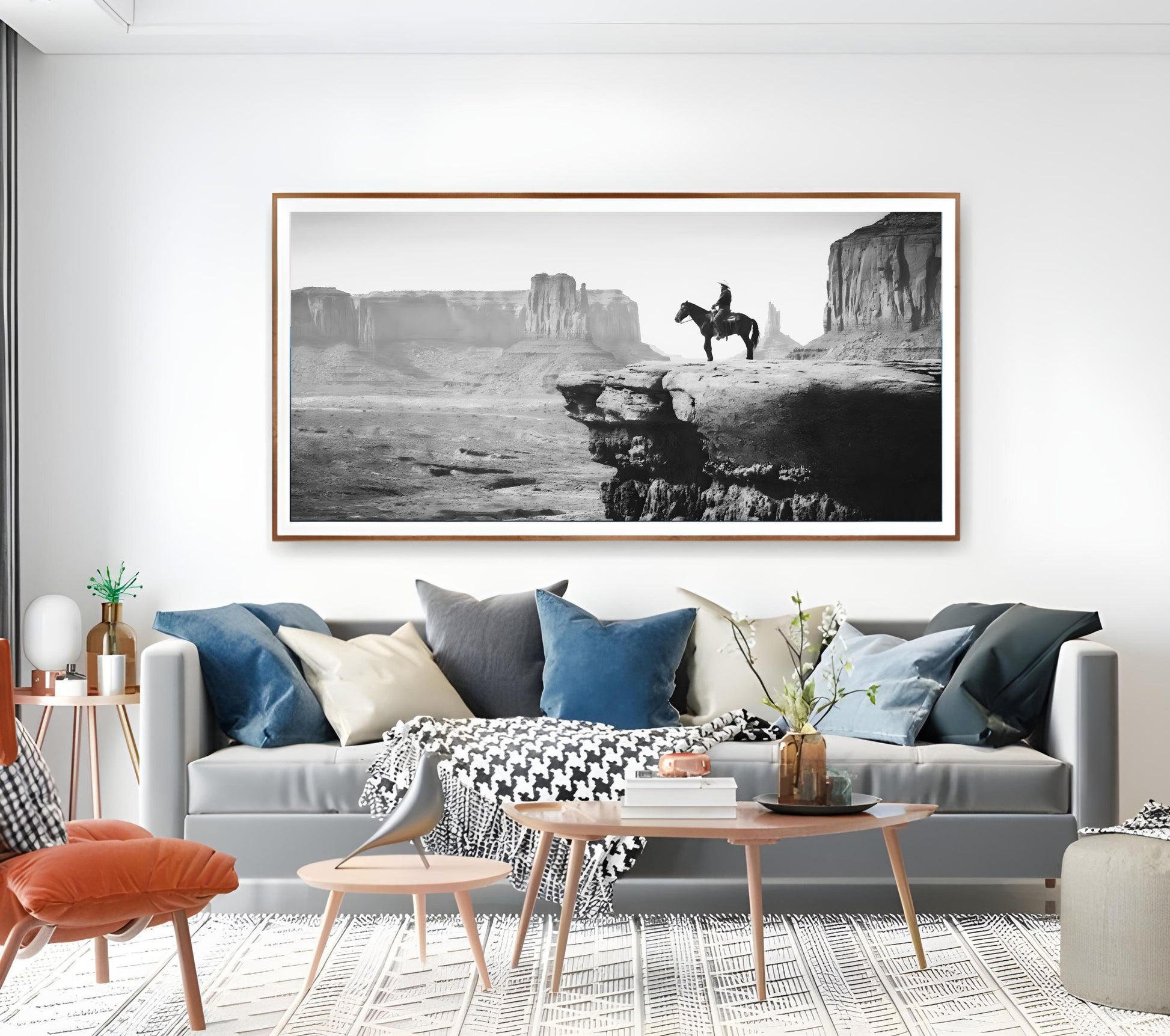 Western Wall Art Print featuring a black and white cowboy landscape on a living room wall.
