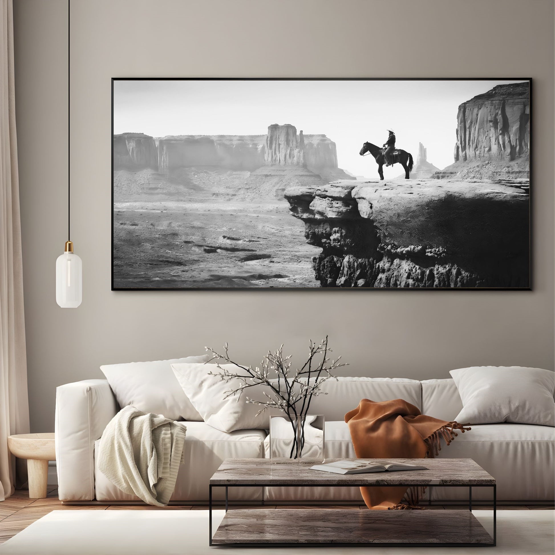 Western Wall Art Print featuring a black and white cowboy scene with vast desert and rock formations, enhancing rustic home decor.