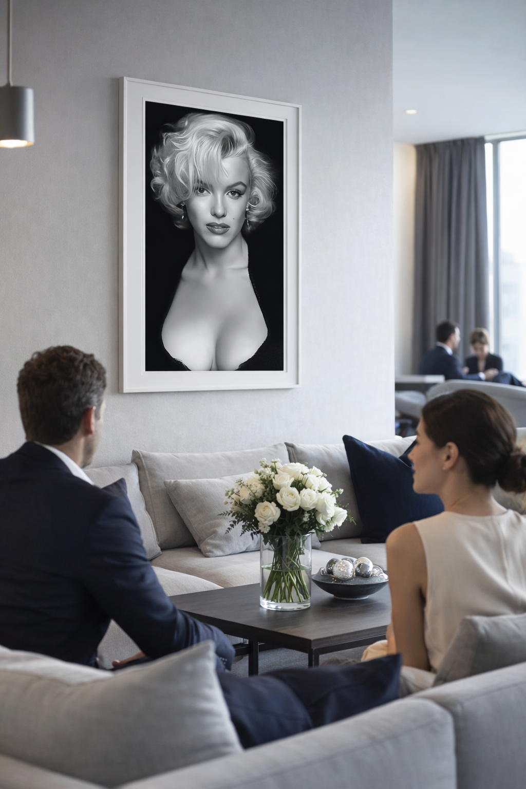 Stylish couple admiring Vintage Hollywood Glamour Wall Art in modern living room setting.