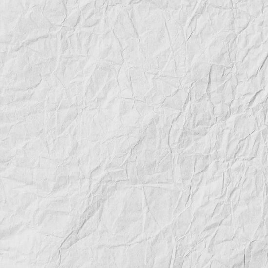 Close-up of wrinkled white paper texture background.