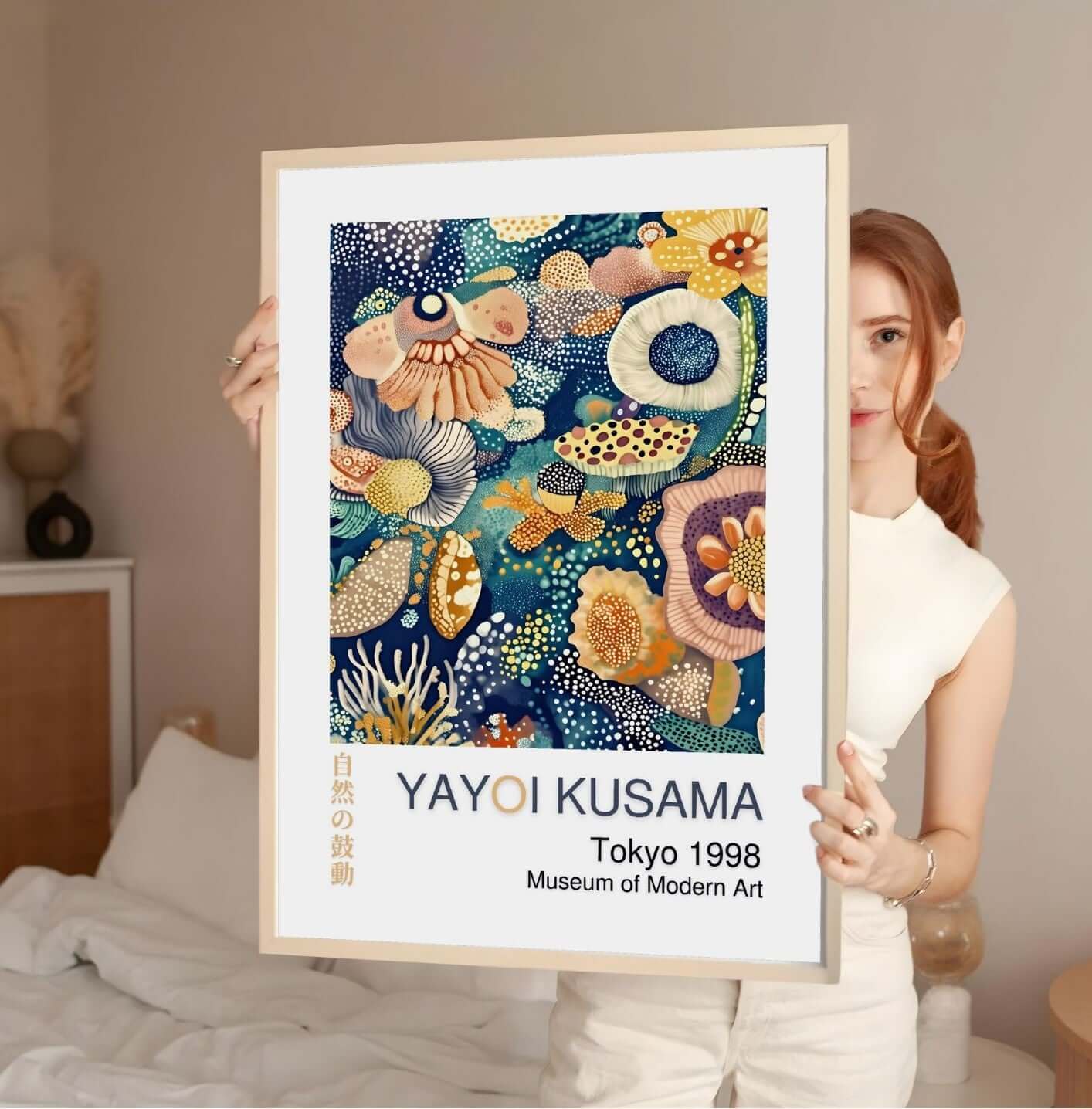 Woman holding Yayoi Kusama abstract wall art poster, Tokyo 1998, featuring vibrant colors and patterns, digital wall art decor.